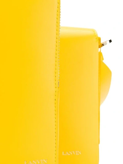 Shop Lanvin Logo Embossed Shoulder Bag In Yellow