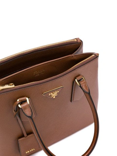 Shop Prada Galleria Top Handle Bag In Brown