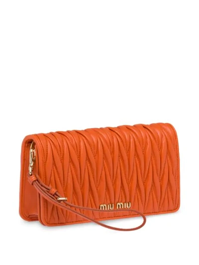Shop Miu Miu Matelassé Mini Bag In Orange