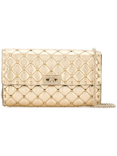 Shop Valentino Garavani Rockstud Spike Clutch In Gold