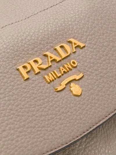 Shop Prada Logo Plaque Backpack In Brown