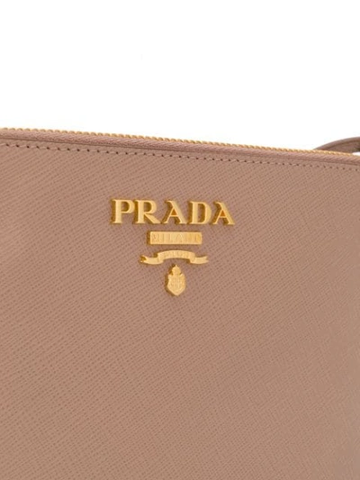 Shop Prada Zipped Clutch In F0236 Cipria