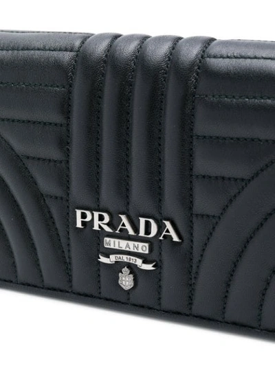 Shop Prada Logo Quilted Shoulder Bag In Black