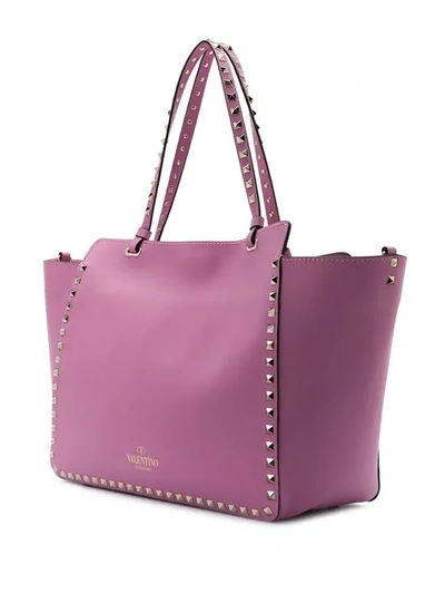 Shop Valentino Garavani Rockstud Trapeze Tote In Pink