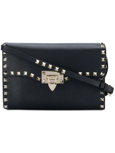 Shop Valentino Rockstud Crossbody Bag In Black