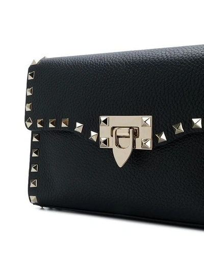 Shop Valentino Rockstud Crossbody Bag In Black