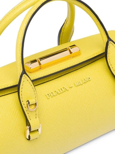 Shop Prada Sybille Duffle Bag In Yellow