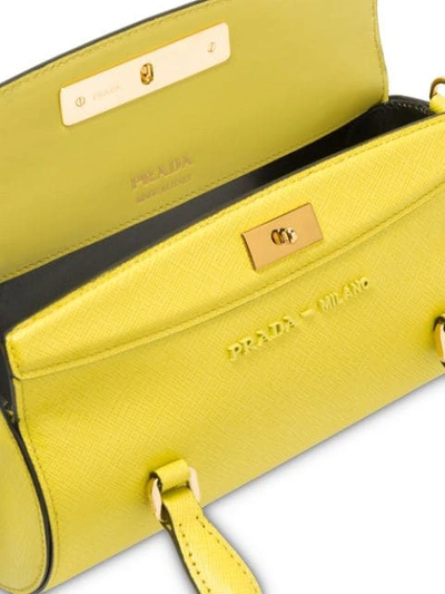 Shop Prada Sybille Duffle Bag In Yellow
