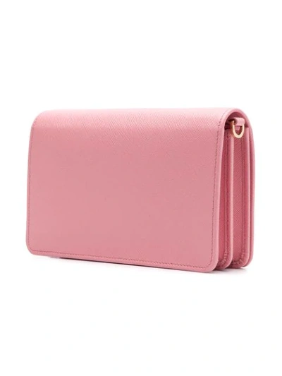 Shop Prada Mini Saffiano Crossbody Bag In Pink