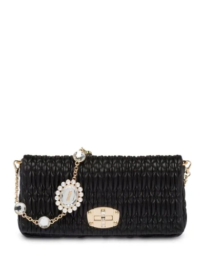 Shop Miu Miu Cloquet Crystal-embellished Shoulder Bag In Black