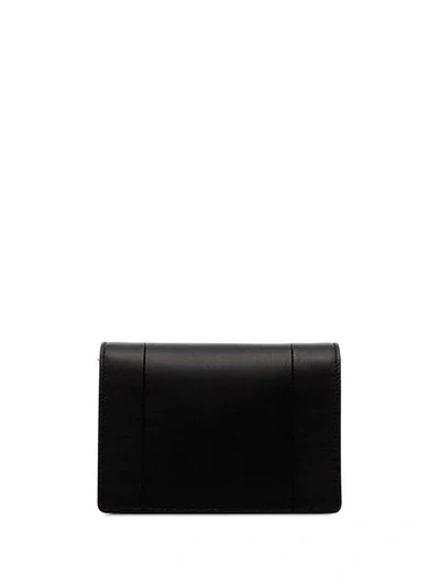 Shop Valentino Garavani Logo Print Leather Crossbody Bag In Black