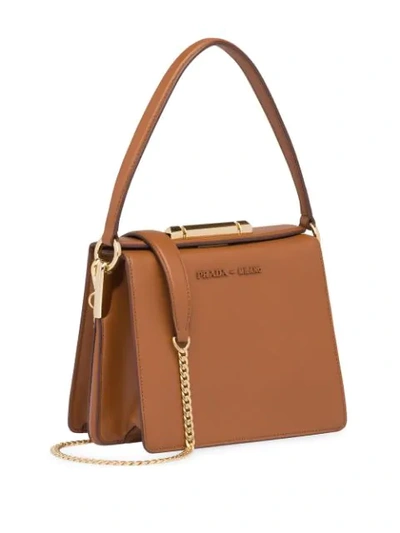 Shop Prada Sybille Leather Bag In Brown