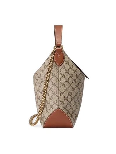 Shop Gucci Grosse Gg Supreme Hobo In Neutrals