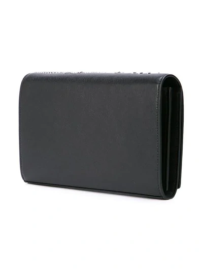 Shop Saint Laurent Monogram Logo Embellished Clutch Bag In Black