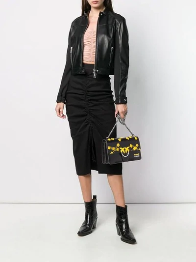 Shop Pinko Love Cross Body Bag In Black