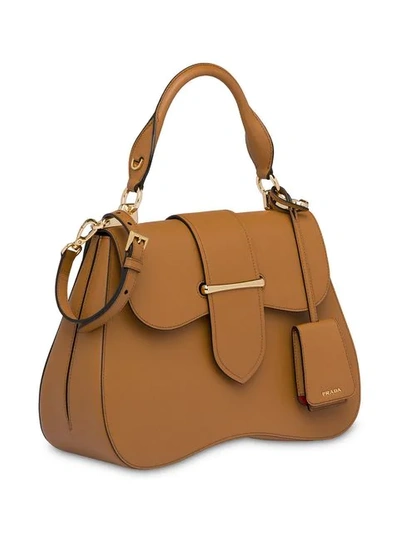 Shop Prada Sidonie Large Saffiano Bag In Brown