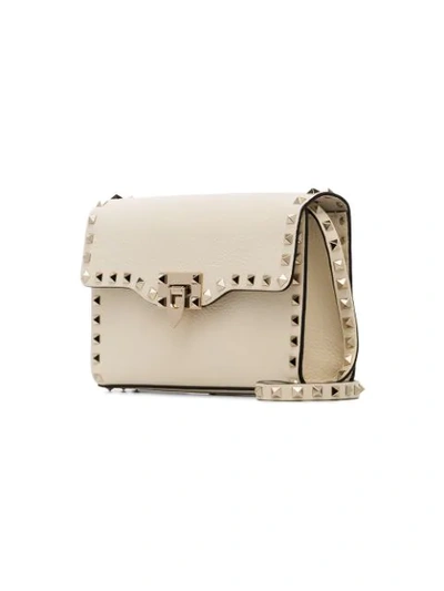 Shop Valentino Off-white Rockstud Leather Crossbody Bag