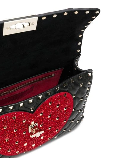 Shop Valentino Garavani Heart Rockstud Spike Crossbody Bag In Black