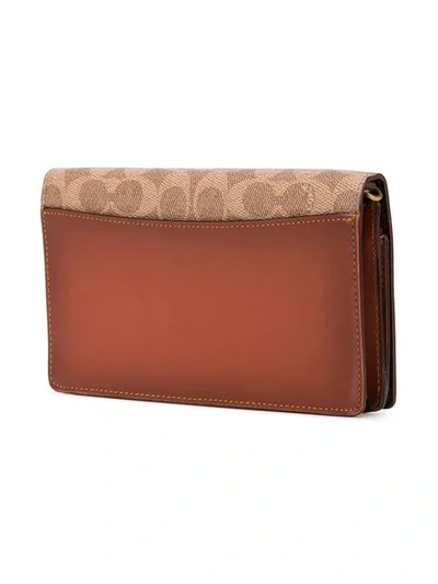 Shop Coach Hayden Foldover Crossbody Clutch In Brown