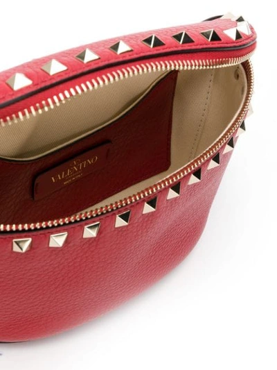 Shop Valentino Garavani Rockstud Belt Bag In Red