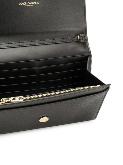 Shop Dolce & Gabbana Dg Flap Clutch In Black