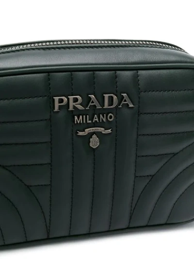 Shop Prada Quilted Logo Crossbody Bag - Green