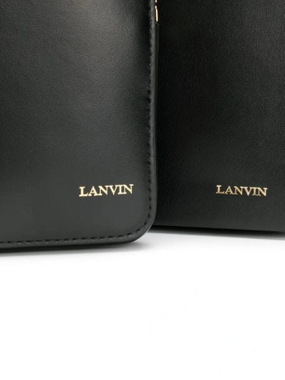 Shop Lanvin Logo Embossed Crossbody Bag In Black