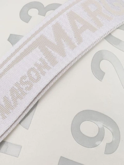 Shop Maison Margiela Logo Embellished Belt Bag In White
