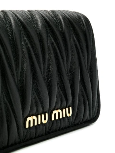 Shop Miu Miu Logo Plaque Belt Bag In Black