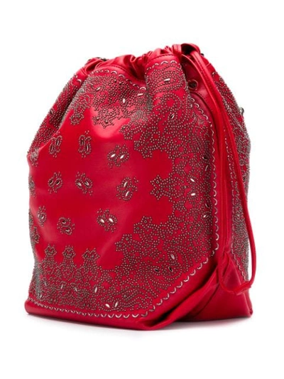 Shop Saint Laurent Embellished Bandana Teddy Bucket Bag In Red