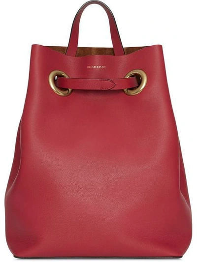 Shop Burberry The Leather Grommet Detail Backpack In Red