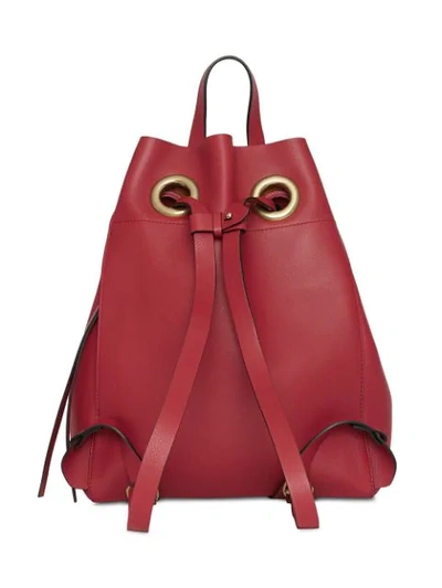 Shop Burberry The Leather Grommet Detail Backpack In Red
