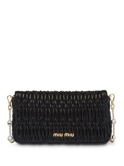 Shop Miu Miu Cloquet Shoulder Bag In Black