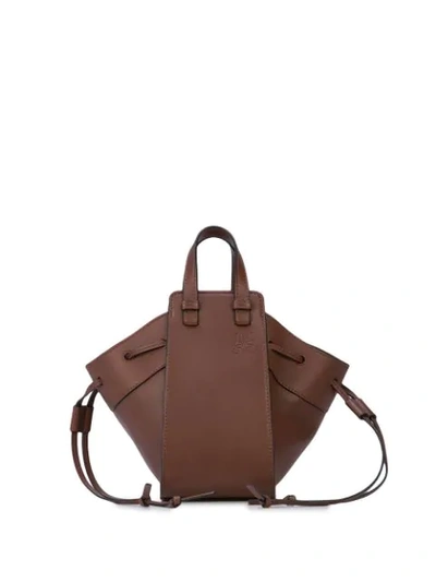 Shop Loewe Logo Embossed Shoulder Bag In Brown