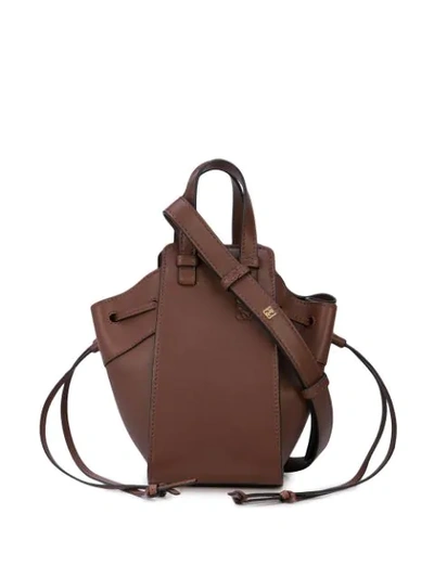 Shop Loewe Logo Embossed Shoulder Bag In Brown