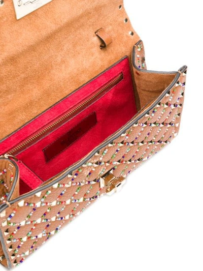 Shop Valentino Garavani Rockstud Spike Crossbody Bag In Brown