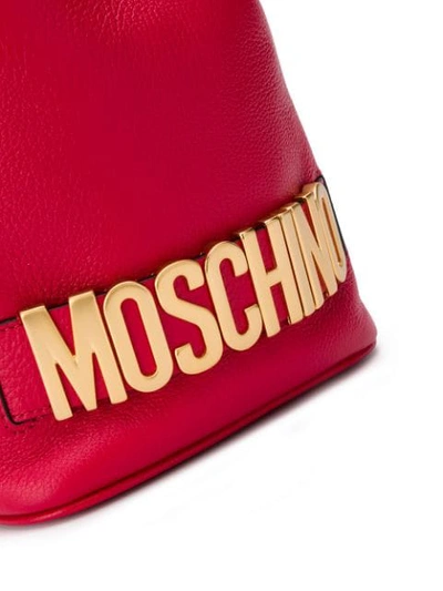 Shop Moschino Logo Bucket Bag In Red