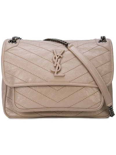 Shop Saint Laurent Logo Weathered Shoulder Bag - Neutrals