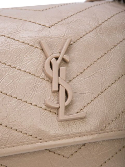 Shop Saint Laurent Logo Weathered Shoulder Bag - Neutrals