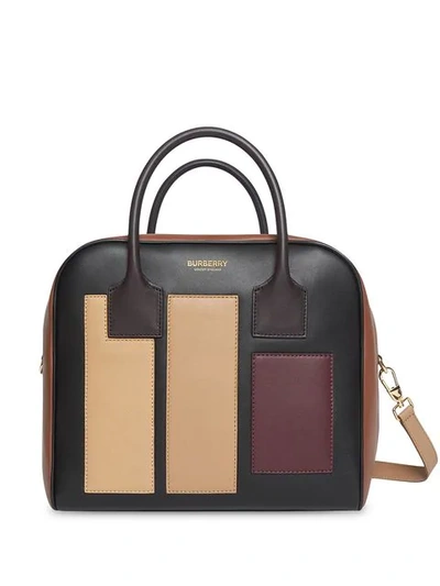 Shop Burberry Medium Panelled Leather Cube Bag In Black