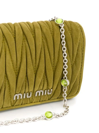 Shop Miu Miu Micro Matelassé Crossbody Bag In Green