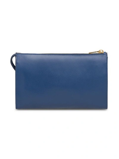 Shop Prada Logo Plaque Clutch In Blue