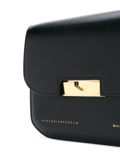 Shop Victoria Beckham Eva Foldover Crossbody Bag In Black