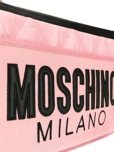 Shop Moschino Quilted Logo Clutch In Pink