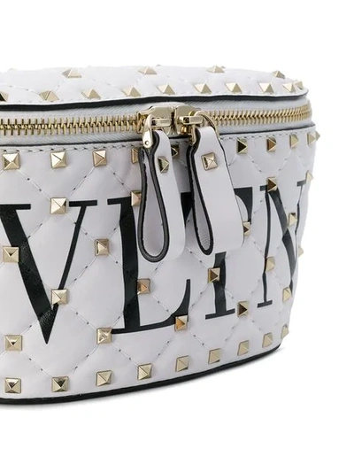 Shop Valentino Garavani Rockstud Spike Belt Bag In White
