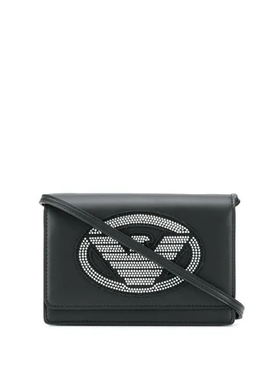 Shop Emporio Armani Studded Logo Crossbody Bag In Black