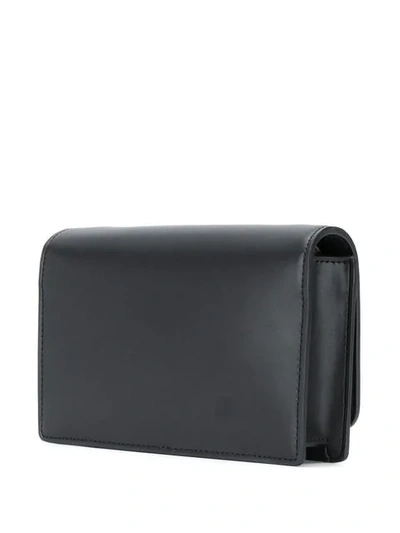 Shop Emporio Armani Studded Logo Crossbody Bag In Black