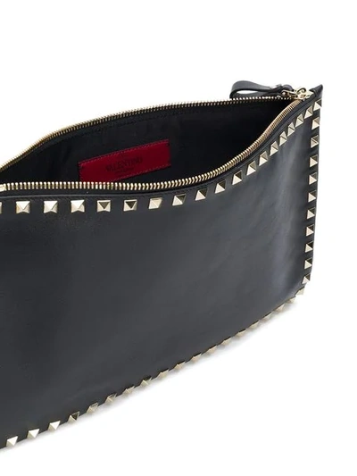 Shop Valentino Garavani Rockstud Clutch In 0no - Black