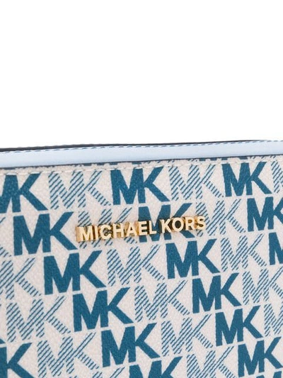 Shop Michael Michael Kors Jet Set Monogram Crossbody Bag - Blue