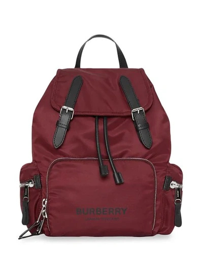 Shop Burberry The Medium Rucksack In Logo Print Nylon In Red